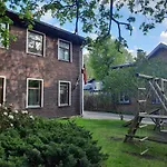 Wooden House Near Center